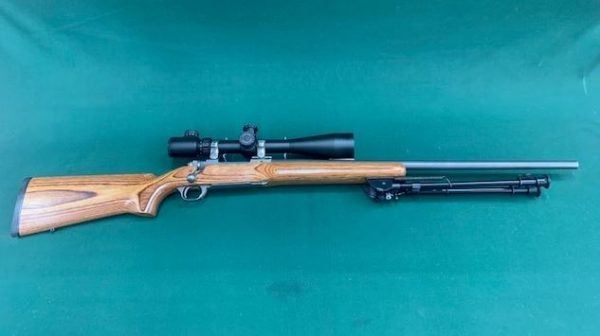 .220SWIFT RUGER MODEL ''77/MKII" BOLT ACTION VARMINT STAINLESS LAMINATE WITH BIPOD & 8-32X50 SCOPE