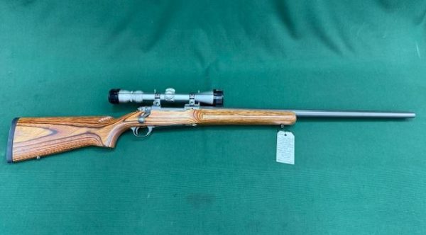 .308 RUGER MODEL M77 MKII VARMINT 26'' STAINLESS BARREL IN LAMINATED STOCK WITH 3-9x40 TASCO PRONG HORN SCOPE